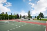 The condo is equipped with tennis rackets and lawn toys for the whole family