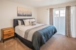 Master bedroom with a King bed opens up to a small garden area