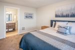 Master bedroom with an in suite full bathroom