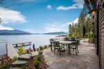 Large patio with plenty of seating for outdoor dining.