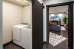 Separate laundry room and yes we even supply the detergent and dryer sheets.