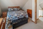 Primary bedroom upstairs, with King bed and work desk