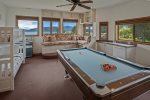 Fabulous game room with pool table and bunk room. Also considered the 5th bedroom.