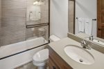 Downstairs full bathroom with shower and tub combination