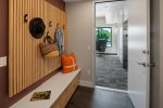 Entry area with custom welcome and bench area. 