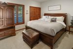 Second bedroom on main floor with King bed. 