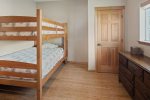Twin bunk beds in third bedroom of guest house. 