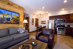 Spacious condo on Fall River, adjacent to the Riverwalk. 3-minute stroll to Estes Park shopping & dining.