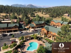 Two Queen Bed Rooms poolside condo. Steps away from hot tub & grill. 5-minute walk to downtown Estes Park!  Minutes from Rocky Mountain National Park 