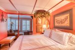 Master Bedroom w Queen Bed, TV, Dresser and walk in Closet