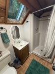 Bathroom in loft with sky light