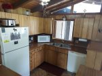PUSH to OPEN cabinets in throughout kitchen area.