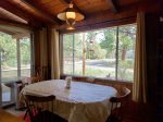 Dining room table has two leafs available for use.