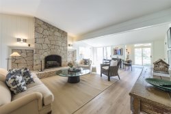 Hidden Ravine modern, clean space with luxurious high-end decor throughout this open concept home. Tucked away near Douglas Beach.