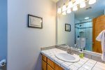 Guest bedroom with walk in shower and great lighting 