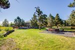 Back Yard is approximately 1/2 acre. Plenty of room to enjoy a game of Football, Frisbee, or let the pups run