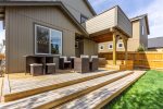 Outdoor furniture for relaxig with a drink or watching the pups lounge in the yard. 