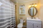 Shared bathroom with tub/shower combo