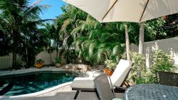 A Tropical Retreat with Lagoon Style Heated Pool, close to Bay and Beach