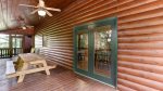 SCREENED IN FRONT PORCH w/PICNIC TABLE