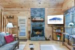 LIVING RM WOOD-BURNING FIREPLACE w/54in. TV