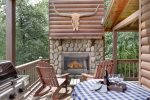 MAIN LVL DECK WOOD-BURNING CORNER FIREPLACE