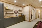 OVERSIZED WET BAR w/PREP SINK, BUILT-IN CABINETRY & CURATED ACCENTS