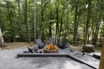 FIRE PIT AMID THE MOUNTAIN FOREST