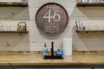 VINTAGE-STYLE WHISKEY MARQUEE GIVING PLAYFUL SPEAKEASY VIBE