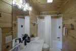 MAIN LVL SHARED FULL BATHRM w/SOAKER TUB/SHOWER COMBO