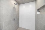 Large walk in shower in the en suite bathroom