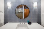 Custom tilework bring a luxury feel to the bathrooms 