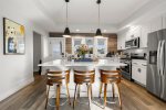 Bright and spacious kitchen with bar seating and brand new everything 