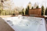 Large hot tub perfect for unwinding at the end of the day