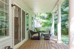 Cozy seating with views of the private, wooded backyard 