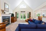 Spacious living area with views of the back yard 