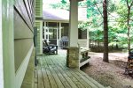 Wrap around porch in wooded setting