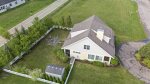 Check out the great backyard with fire pit and back porch