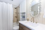 Hall bathroom with tub / shower 