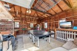Garage game room with Ping Pong and golf cart 