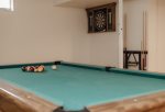 Pool table & more in the large basement game room 