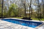 Enjoy a dip in the pool in the backyard