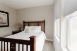 Queen bed in this top floor bedroom