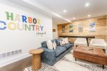 The basement game room is perfect for kids and kids at heart