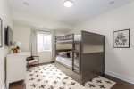 Full bed bunks with a trundle bed & smart TV