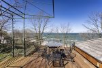 Rooftop deck with dining and endless views of the lake