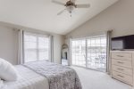 Upstairs primary bedroom with en suite and private deck