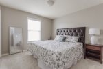 Rest up in this second story bedroom with comfy King bed