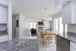 Open plan living with dining and seating area off the kitchen