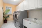 Large laundry room for guest use 